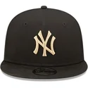 schwarze-snapback-cap-mit-flachem-schirm-und-beigem-logo-9fifty-league-essential-der-new-york-yankees-mlb-von-new-era