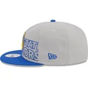 graue-und-blaue-snapback-kappe-9fifty-draft-edition-2023-der-golden-state-warriors-nba-von-new-era