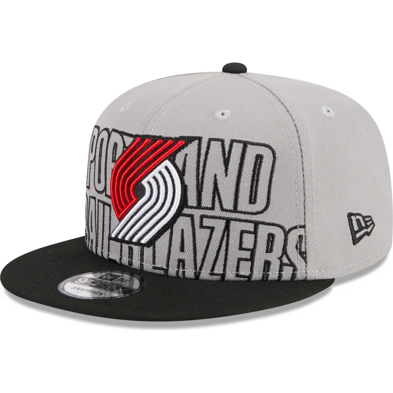 graue-und-schwarze-flache-snapback-kappe-9fifty-draft-edition-2023-von-portland-trail-blazers-nba-von-new-era