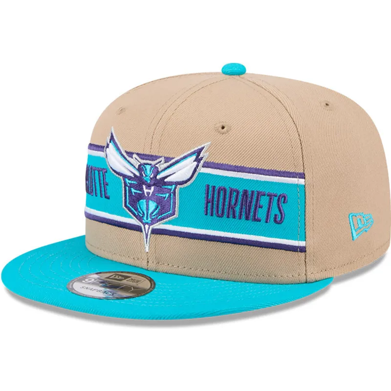 braune-und-blaue-flatcap-snapback-9fifty-draft-2024-der-charlotte-hornets-nba-von-new-era