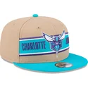 gorra-plana-marron-y-azul-snapback-9fifty-draft-2024-de-charlotte-hornets-nba-de-new-era