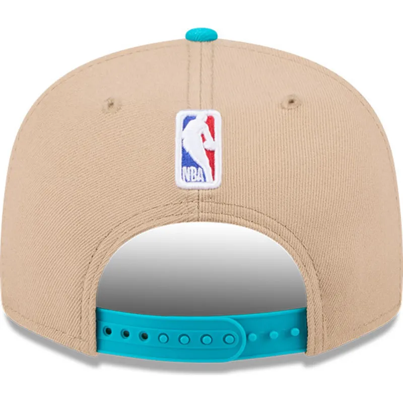 braune-und-blaue-flatcap-snapback-9fifty-draft-2024-der-charlotte-hornets-nba-von-new-era