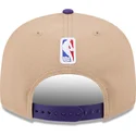 gorra-plana-marron-y-violeta-snapback-9fifty-draft-2024-de-los-angeles-lakers-nba-de-new-era