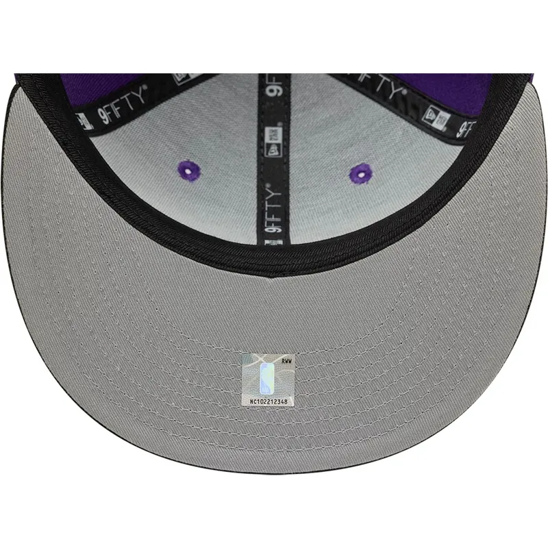 violette-und-schwarze-flache-snapback-kappe-9fifty-classic-der-toronto-raptors-nba-von-new-era