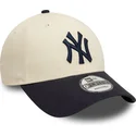 verstellbare-9forty-colour-block-kappe-in-beige-und-marineblau-der-new-york-yankees-mlb-von-new-era