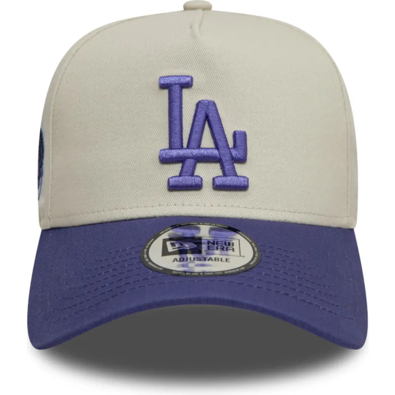 beigefarbene-und-violette-snapback-kappe-mit-gebogenem-schirm-und-violettem-logo-9forty-a-frame-world-series-patch-der-los-angel