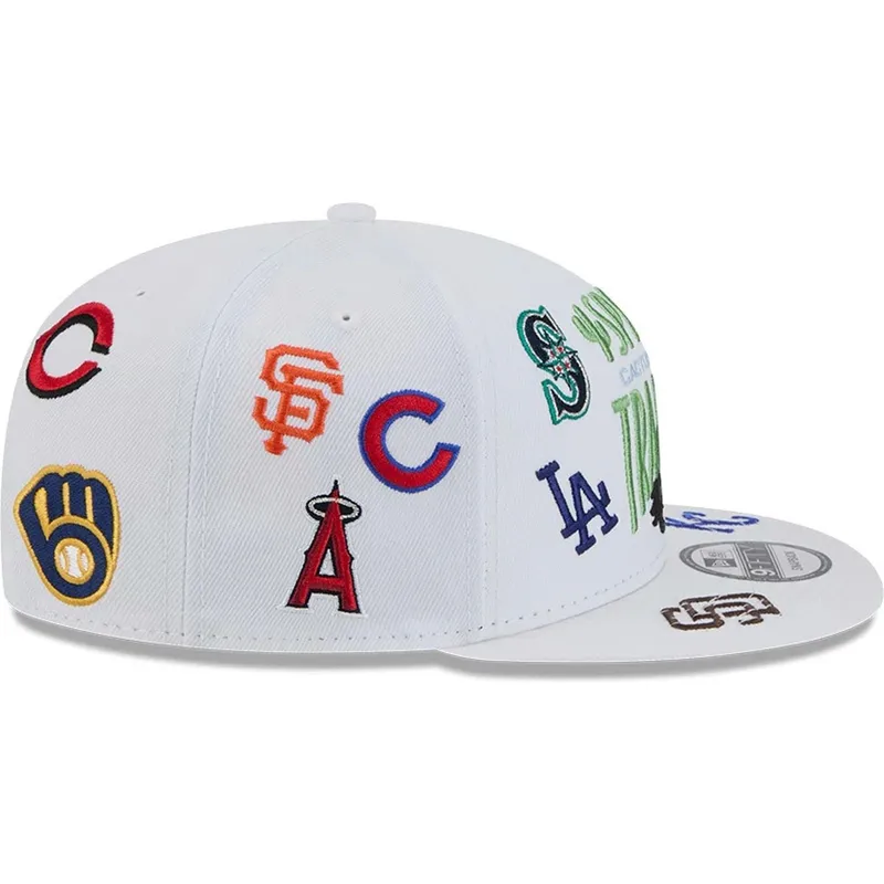 cepur-plakana-balts-snapback-9fifty-scatter-spring-training-fan-pack-2025-no-mlb-no-new-era
