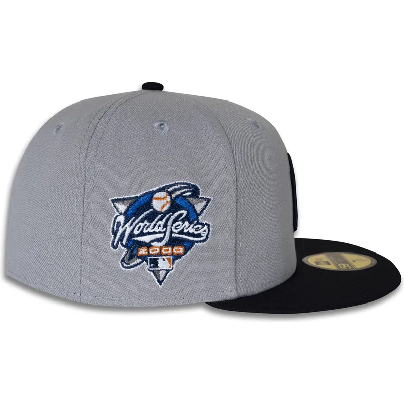 graue-und-marineblaue-anliegende-flatcap-59fifty-world-series-2000-side-patch-der-new-york-yankees-mlb-von-new-era