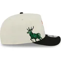 beige-und-schwarze-snapback-9fifty-a-frame-precurved-hardwood-classics-kappe-der-milwaukee-bucks-nba-von-new-era