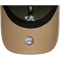 grune-und-braune-verstellbare-curved-cap-9twenty-mini-washed-contrast-der-oakland-athletics-mlb-von-new-era