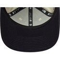 casquette-plate-beige-snapback-avec-logo-bleu-marine-9fifty-original-fit-world-series-new-york-yankees-mlb-new-era